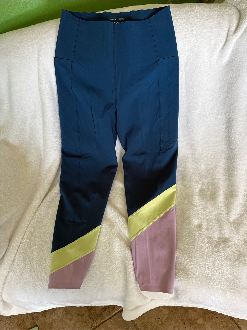 Sweaty Betty Navy Leggings with Pink and Yellow Colorblock Panels